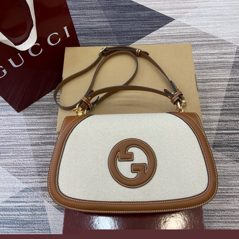 G*u*i top handle bags